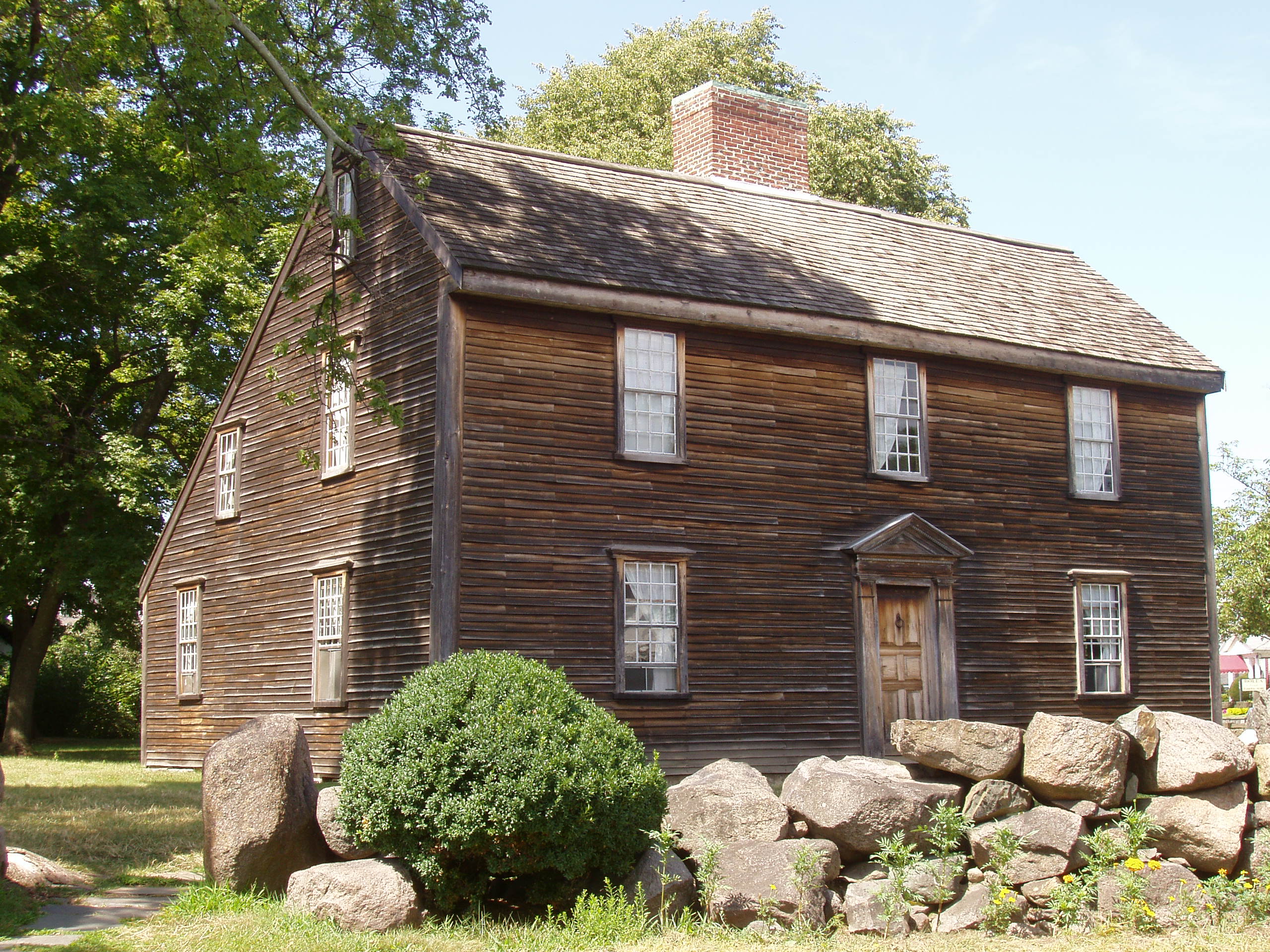 When people had to find wood to burn for heating and there was no A/C, they were much better at designing low energy homes, like this 'saltbox' style New England home.